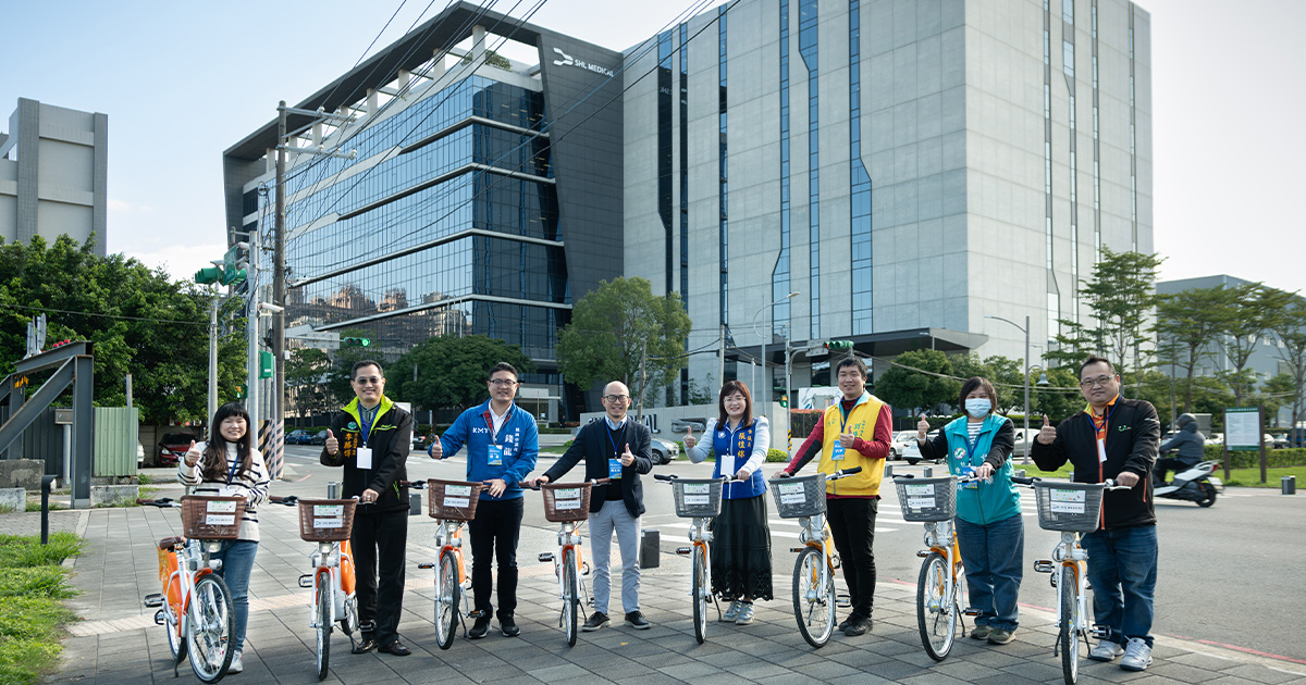 Government officials and SHL representatives take group photo in front of Liufu building with YouBIke Station